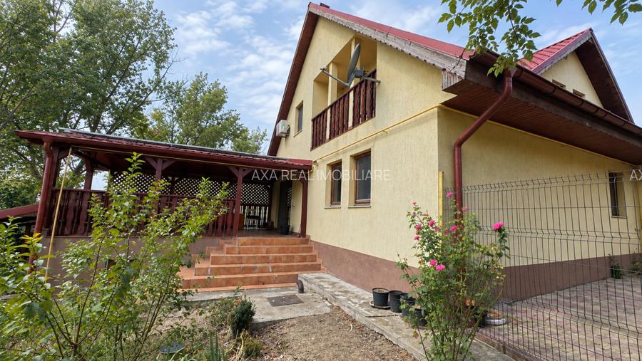 Casă de lemn pe malul lacului, Balotești — 7 camere - 9
