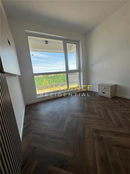 Apartament 2 camere tip Studio + 75 mp curte proprie