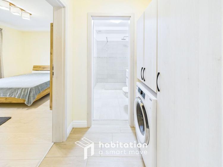 Apartament spațios cu curte și garaj – confortul unei case moderne