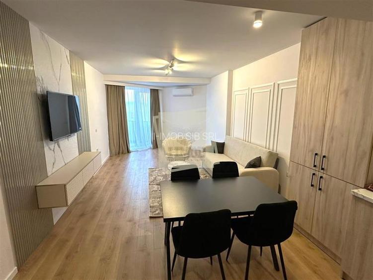 Apartament de lux 58 mp utili terasa 15 mp parcare in Evolution - 2