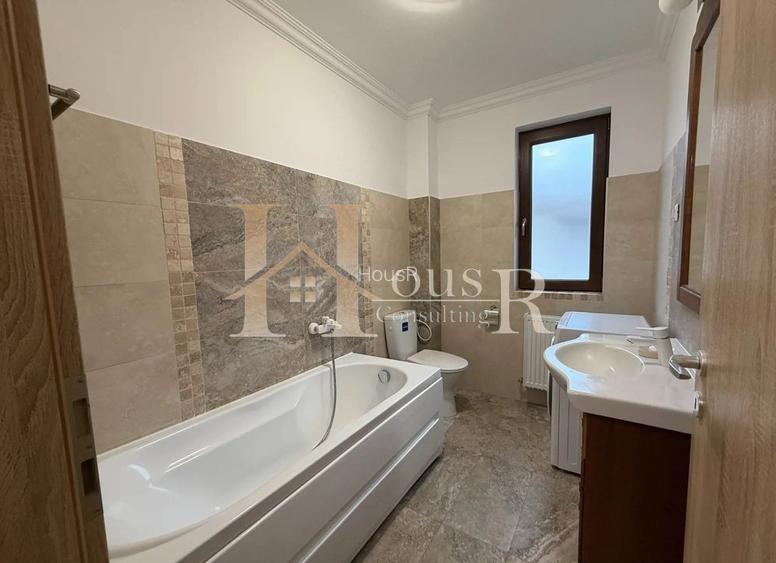 Strada asfaltata. Bucatarie inchisa. Decomandat. - 12