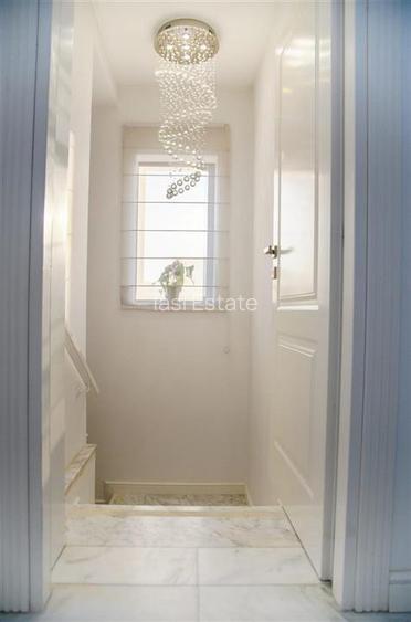 Casa intr-o zona linistita cu garaj si teren-1091 mp - 6