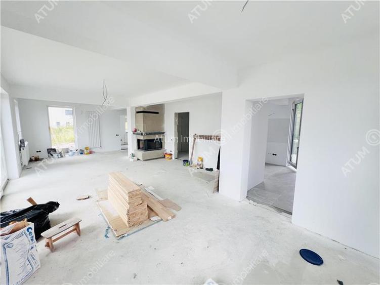 Casa individuala in Cisnadioara cu 4 camere 2 bai terasa teren 1170 mp - 27