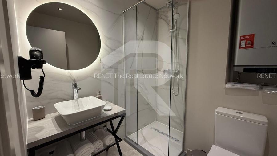 Garsoniera de lux zona Unirii Traian 57000  E - 5