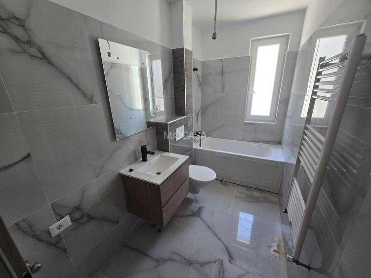 Model spatios - 55 mp. Decomandat. Bucatarie inchisa. - 12