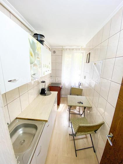 Titan, Auchan, str. Jean Steriadi, - 4