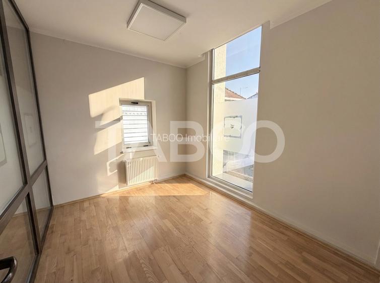 Cladire de birouri cu spatiu comercial la parter si 6 locuri parcare - 7