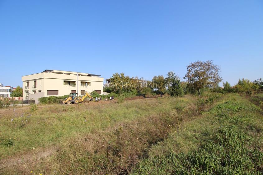 Teren 5963 mp deschidere lac Grivita 42 m cu deschidere la strazi 77 m - 7