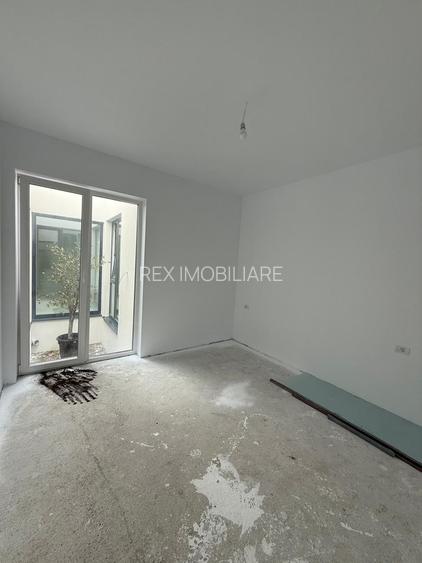 Duplex Spatios parter 4 camere - zona Ion Creanga- Dumbravita - 9