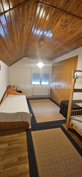 Ciorogarla-casa Sp+ P+M, garaj 2 loc+pod locuibil si casa oaspeti, teren=1097mp - 6