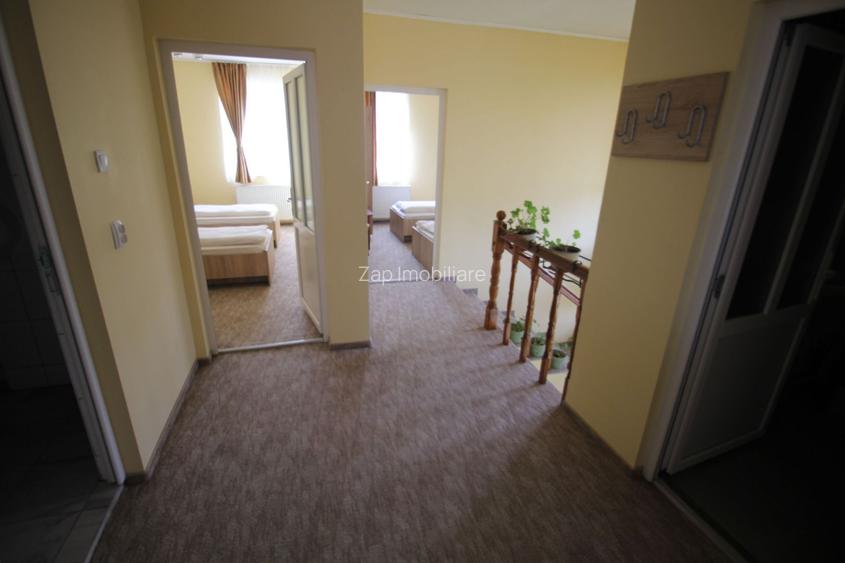 Casa 4 camere,4 bai,1 bucatarie,1 living,120 mp,500mp teren - 16