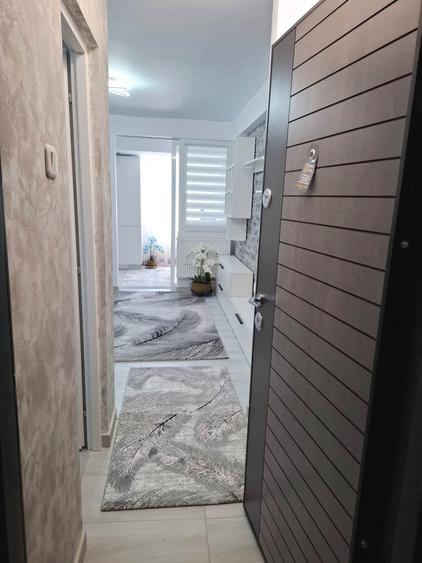 Garsoniera RENOVATA de la placa, CT, AC, mobila la comanda, utilata, etaj 2