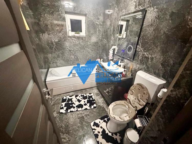 E3, decomandat,  3 camere, renovat ultramodern - 9