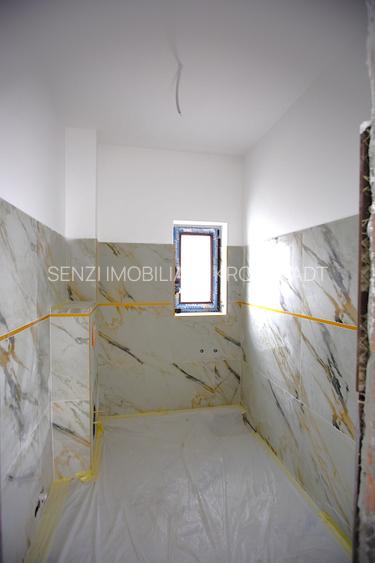 Vila conceputa pentru 3 familii Sanpetru spre Harman - 10