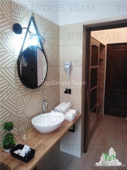 Pensiune premium de vanzare in Voronet - 1.610 mp utili, teren 1.021 mp, afacere - 11