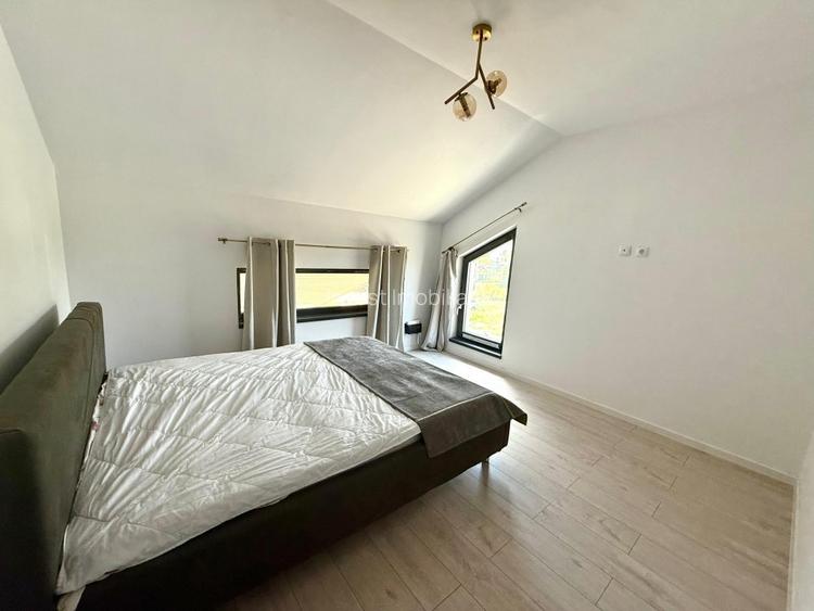 Vila de vanzare cu design deosebit in cartierul Bucium - 26