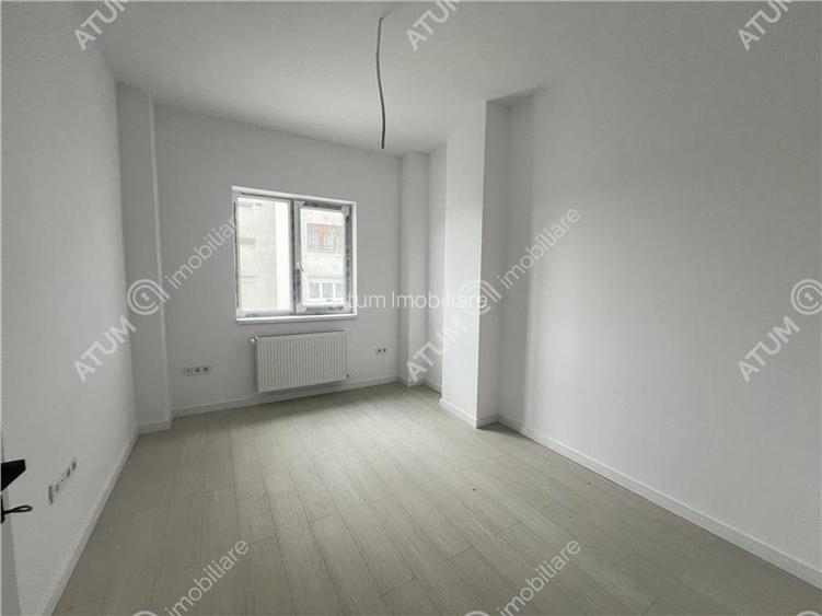 Apartament de 3 camere cu 2 bai etaj intermediar zona Rahovei - 3
