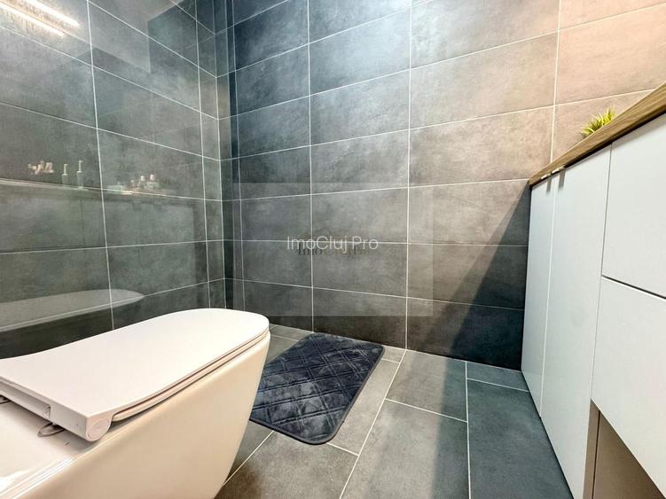 Vânzare  3 camere Grigorescu- -etaj 5/10-2 băi- parcare subter- terasa - 22