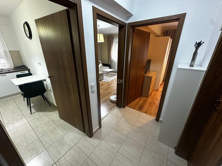  Închiriez apartament cu 2 camere decomandate și parcare privată  - 5