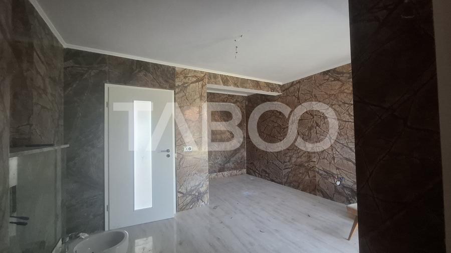 Casa de vanzare 405 mp utili 2 garaje 250 mp terase Slimnic Sibiu