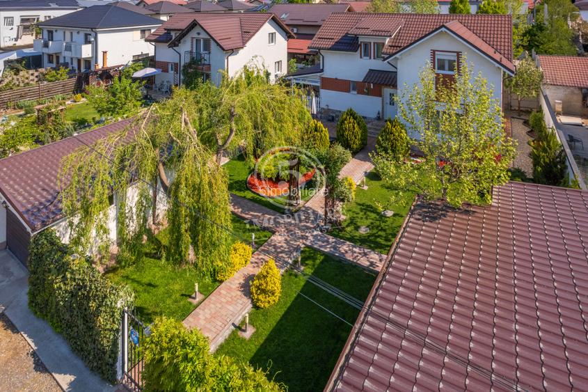 Casa cu probabil cea mai frumoasă grădină din Bragadiru + 2 garaje - 3