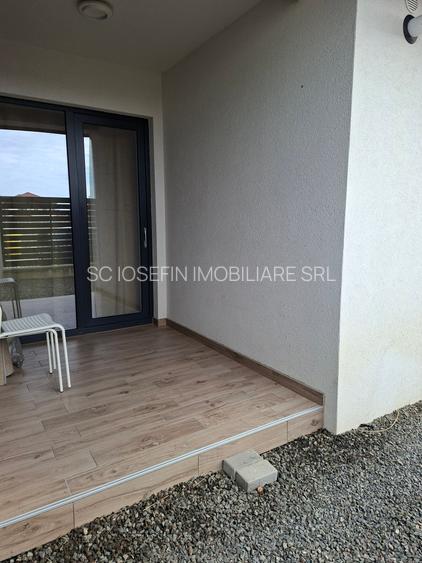 Bloc nou,  apartament   cu  parcare si curte proprie. - 12