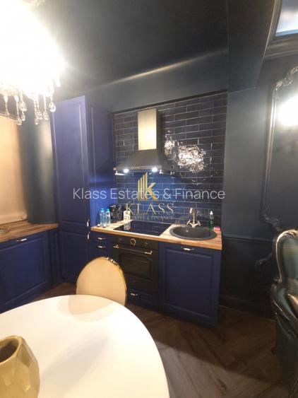 Apartament cu 2 camere - Bd. Dacia -P-ta  Romana - 9