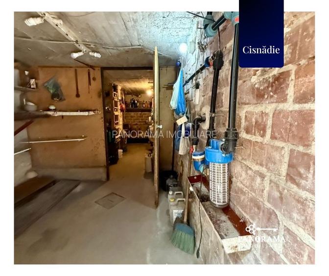 Casă cu grădină proprie, garaj, pivniță și teren în centrul Cisnădiei - 15