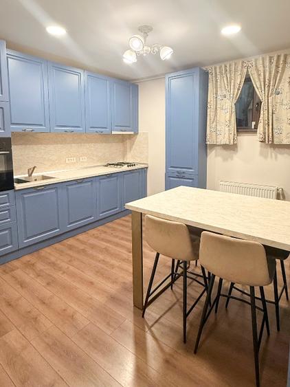 Apartament premium cu grădină proprie și două locuri de parcare.