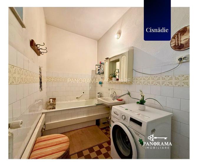 Casă cu grădină proprie, garaj, pivniță și teren în centrul Cisnădiei - 12