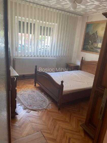 Vând apartament la parter 3 camere 74 metri pătrați utili  80.000€ - 12