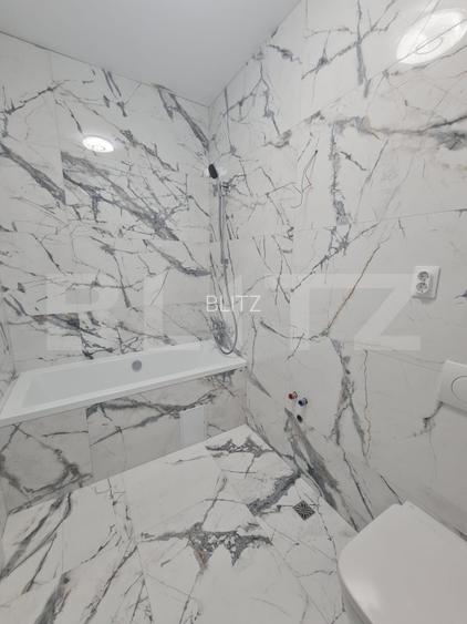 Apartament cu 2 camere, finisaje noi, terasa, parcare subterana, zona centrala - 10