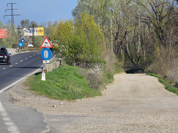 10.100mp TEREN CONSTRUCȚII INTRAVILAN POTIGRAFU, DESCHIDERE 31m direct la DN1 - 7