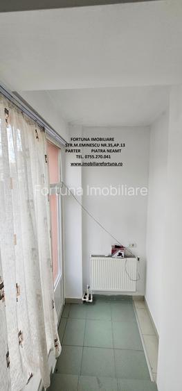 Locuinta individuala(apartament 4 camere)+spatiu comercial si teren ,Darmanesti - 16