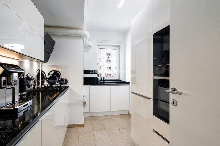Apartament cu terasa cat o gradina,trei  boxe si doua locuri de parcare subteran - 35