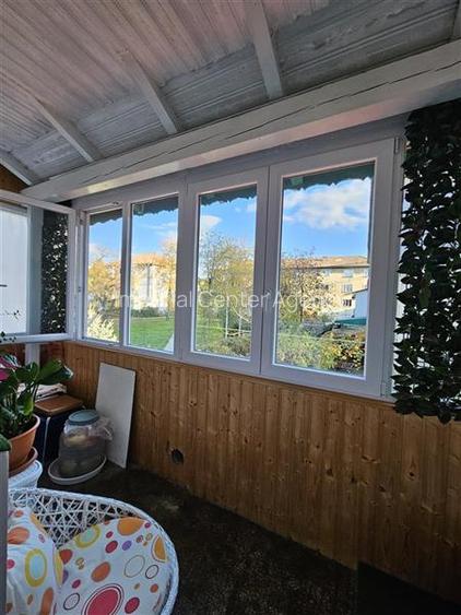 Apartament cu GRADINA SI ACOPERIS  MANSARDA DE VANZARE IN ONESTI ETJ 1 - 2