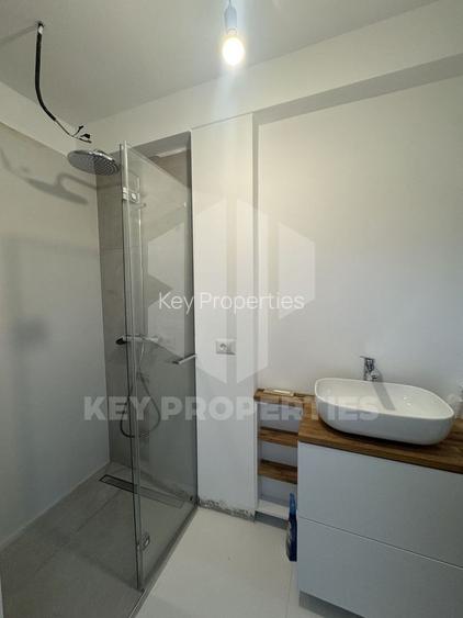 Piata Romana, mansarda boema, finisaje in linii simple si elegante - 10