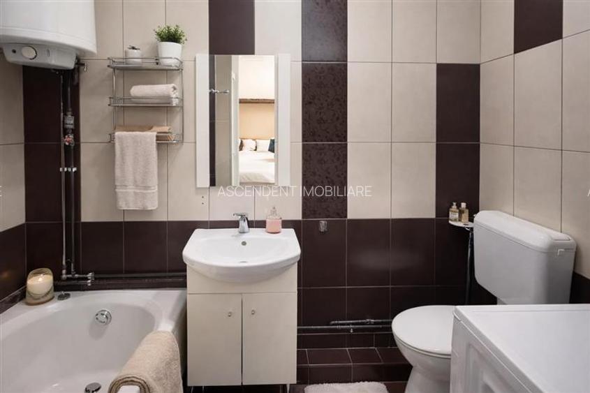 Garsoniera luminoasa cu bucatarie utilata si baie cu cada - 4