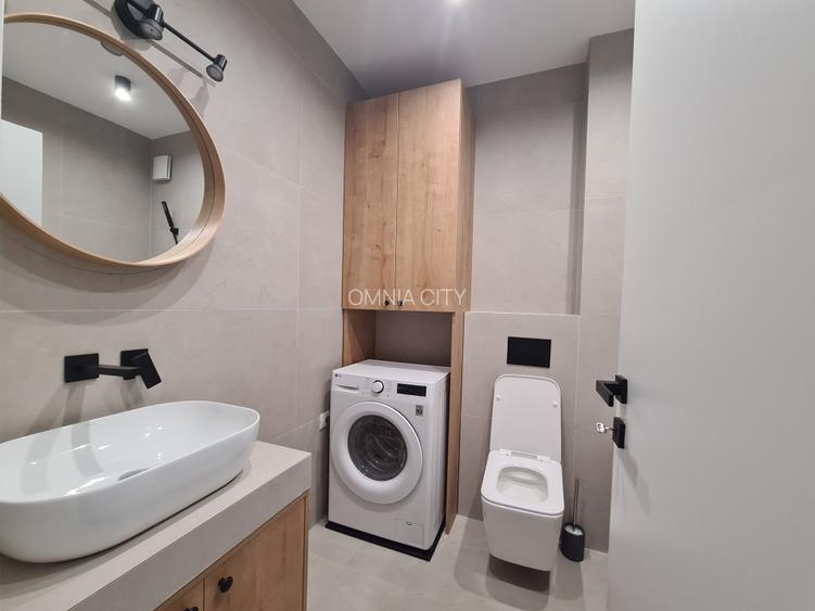 Apartament luminos,  zona  buna, bine compartimentat, mobilat, prima inchirere. - 15