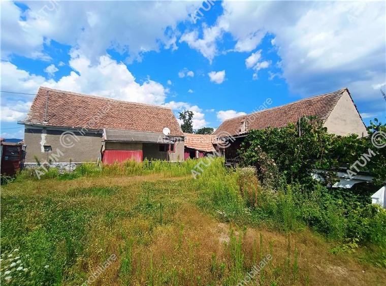 Casa cu 4 camere si 1650 mp teren la doar 30 km distanta de Sibiu - 2
