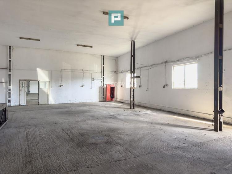 Teren intravilan 6.555 mp cu hală industrială - 3