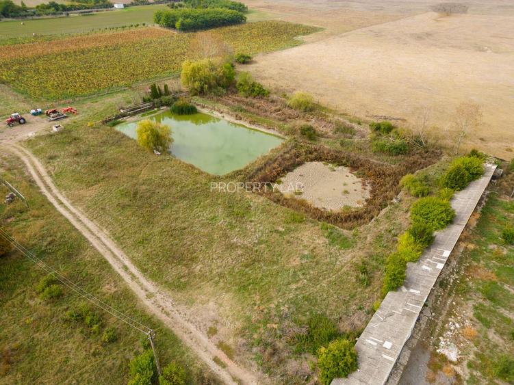 Casă cu teren 13 418 mp intravilan
