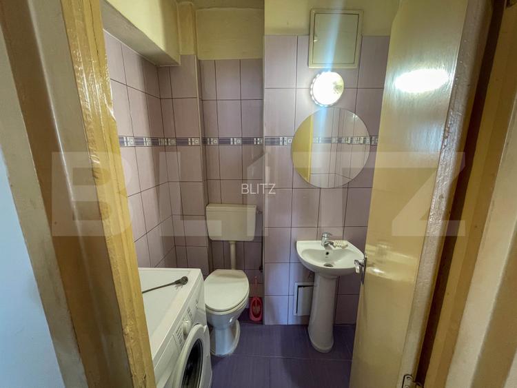 Apartament de 3 camere decomandat, 75 mp, 2 băi, 2 balcoane, etaj intermediar. - 18