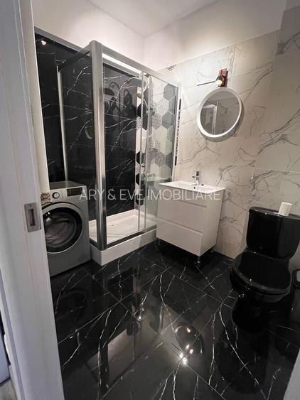 Oază de liniște la Unirii: Apartament modern în bloc nou, costuri minime - 4