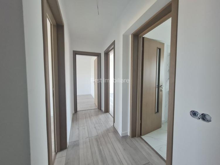 Vila cu 4 camere,2 bai,finisaje deosebite,curte 330 mp - 11