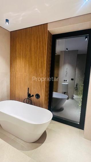 Casă Parter cu Design Minimalist și Piscină - 12