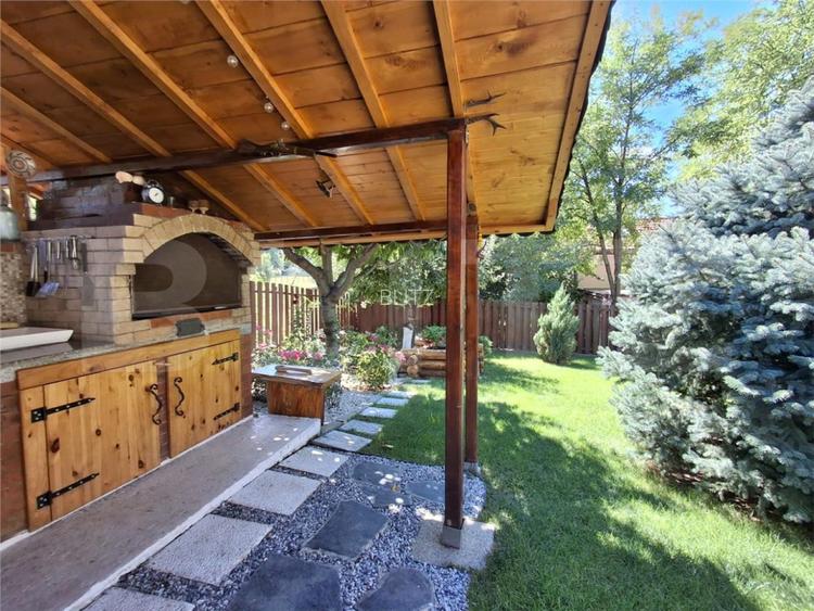 Proprietate eleganta cu teren mare si garaj in Bucium, perfecta pentru familie - 18