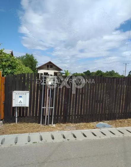 5000 mp teren + casa vacanta in Bascov - 2