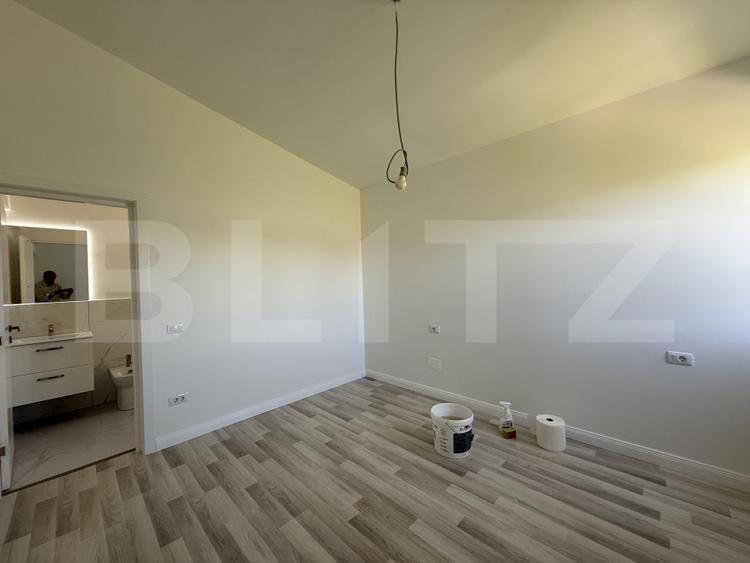 Casa pe parter cu un design deosebit, zona nordica / Simnicul de Jos