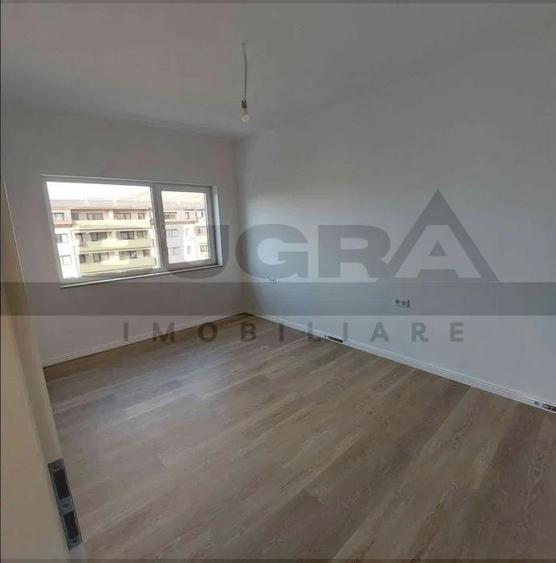 Apartament finisat cu 3 camere, 75 mp, parare, zona Baciu Regal